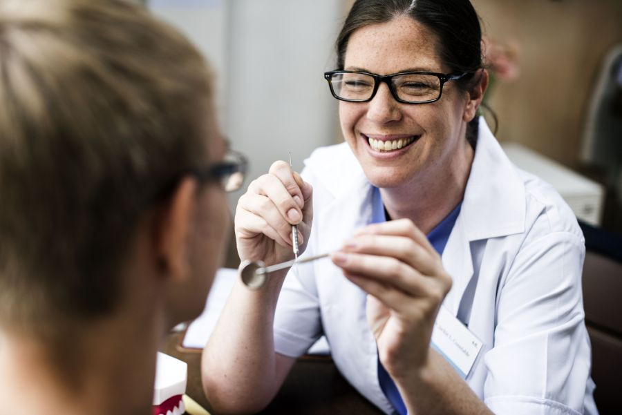 Dentist with her patient